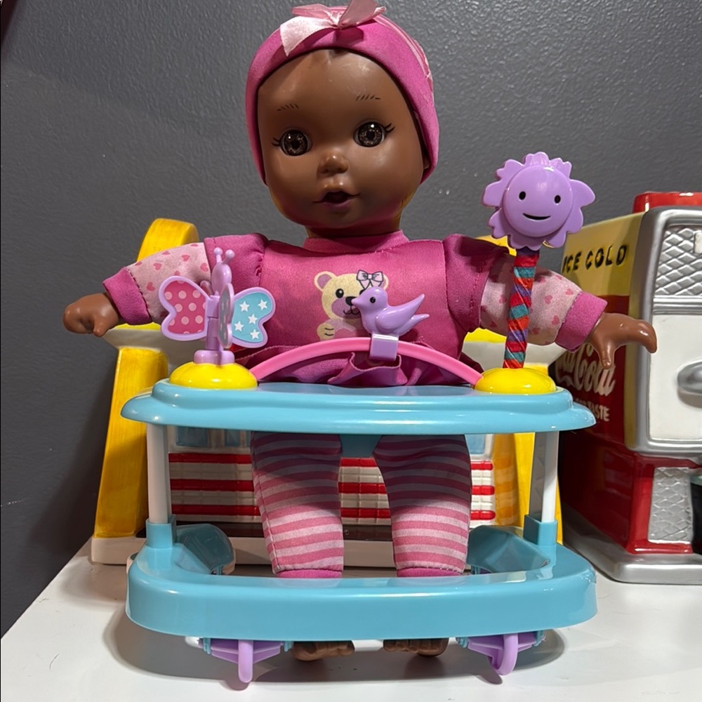 Baby doll in walker